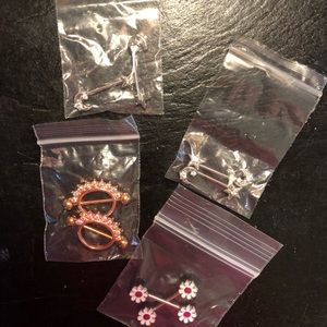 Set of nipple barbells.